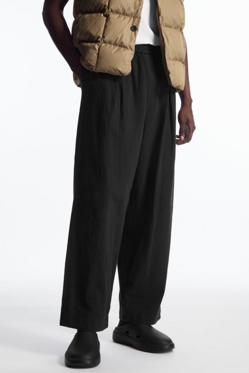 Black COS Pleated Wide-Leg Chambray Trousers Trousers | UU71-P6AT